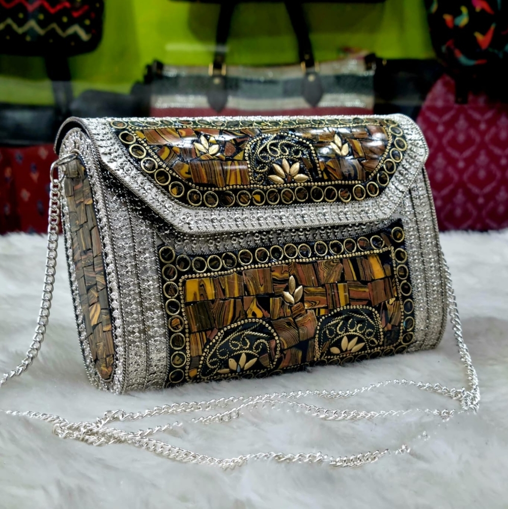 Ethnic metal clutch